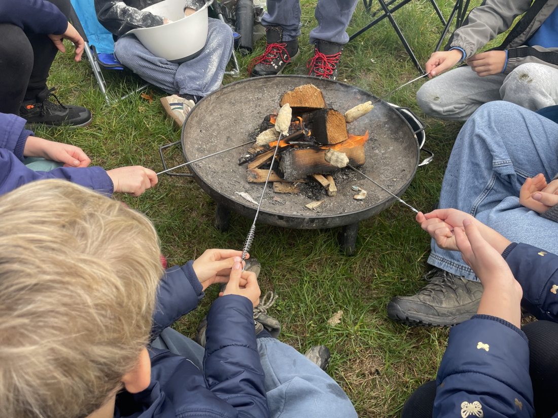 Families gathering around the fire